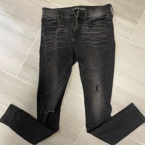 Express distressed mid rise skinny jeans with stretch. Size 2.